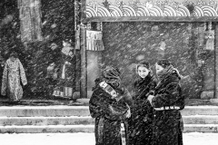 Acquaintance Under Heavy Snow Falls